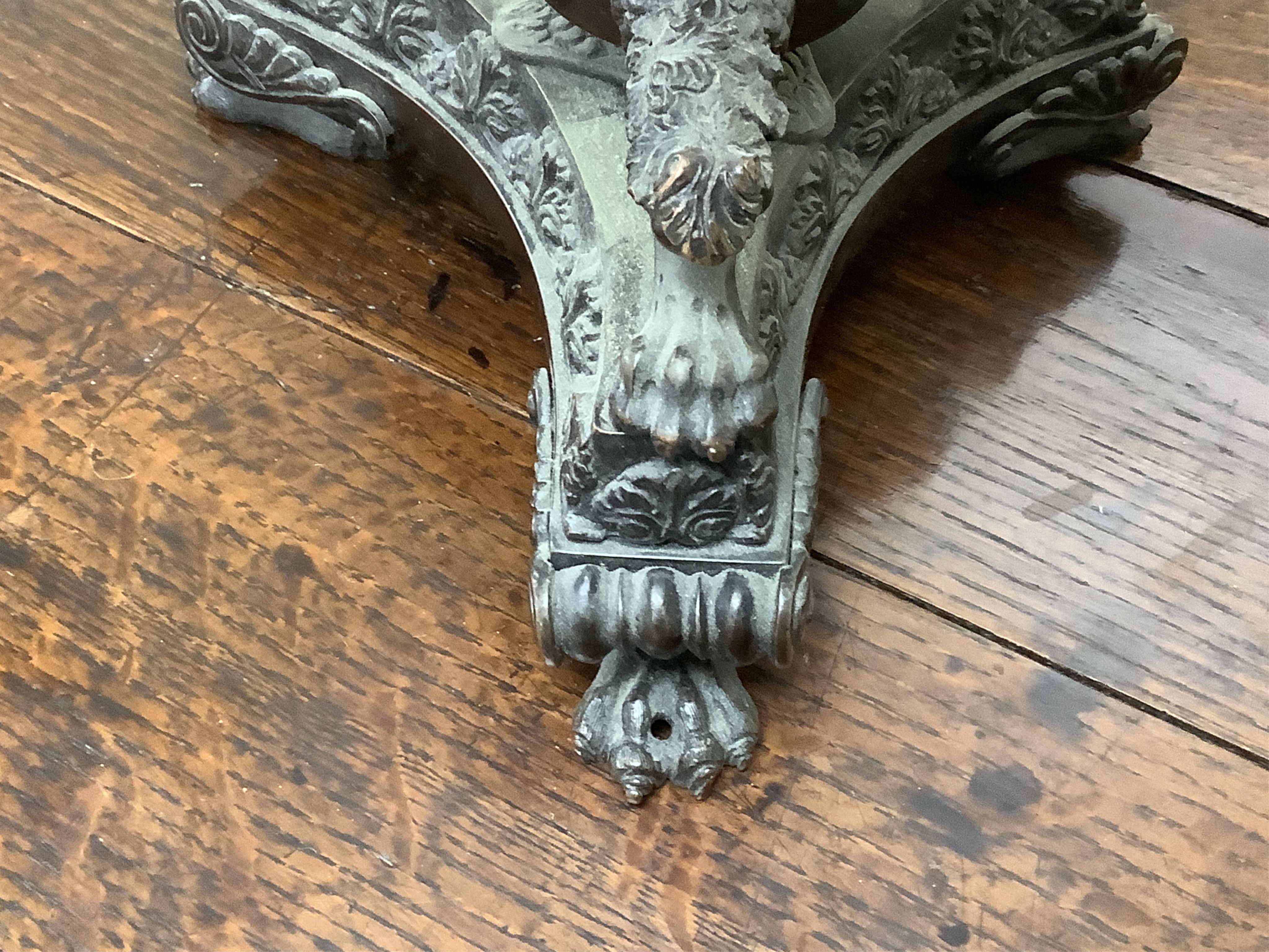 A large cut glass tazza, on bronze tri-form pedestal base, 39cm high.